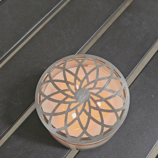 Gilded rosette metal candle topper on jar candle for vintage decor