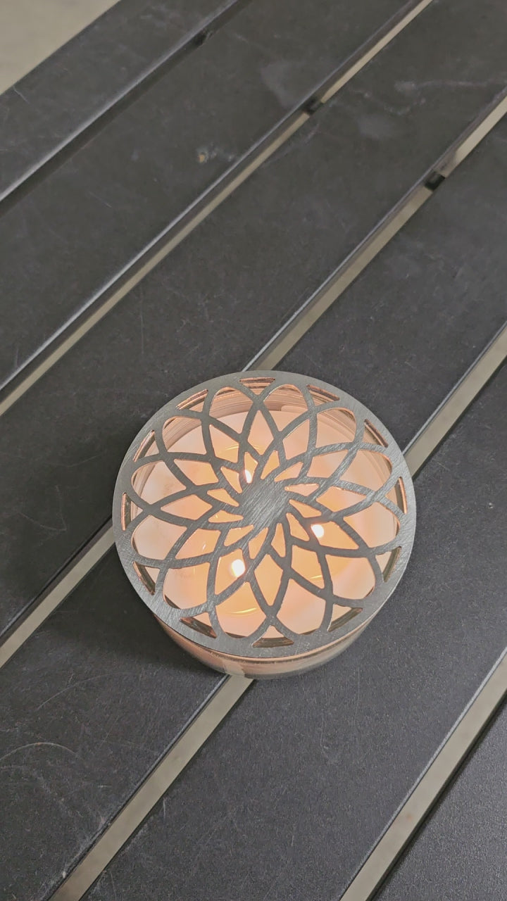 Gilded rosette metal candle topper on jar candle for vintage decor