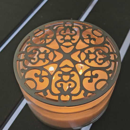 Whisperlight Filigree metal candle topper on jar candle