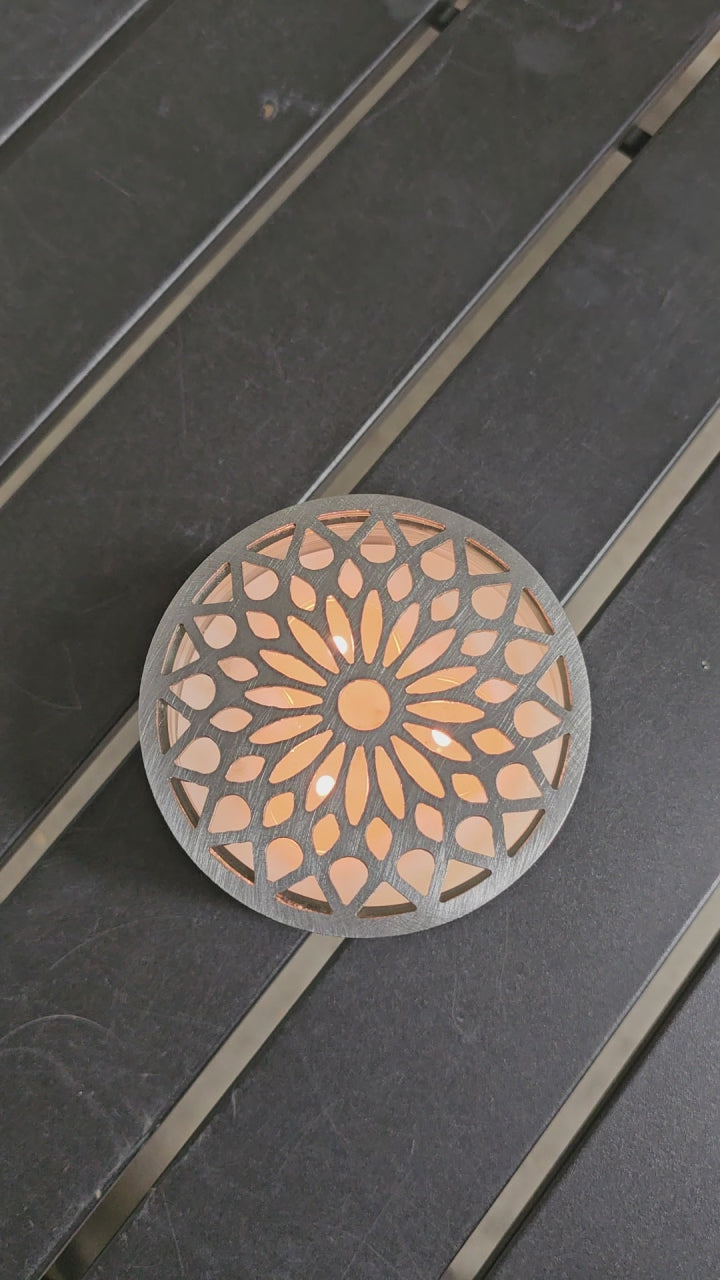 Mosaic crown candle topper on lit candle