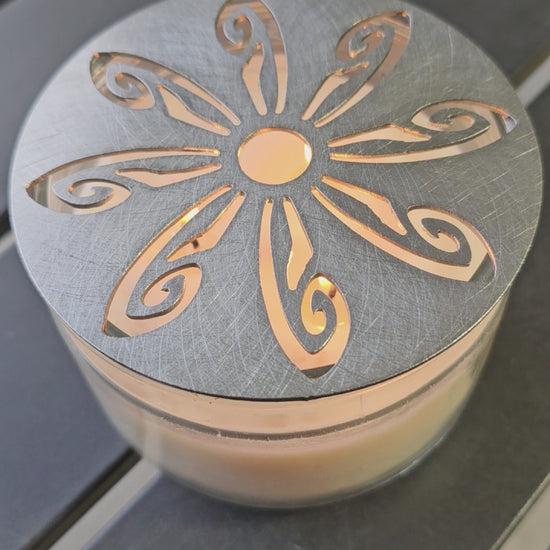 “Radiant Wings Candle Topper featuring decorative cutout design in metal finish for improved candle burning performance.”