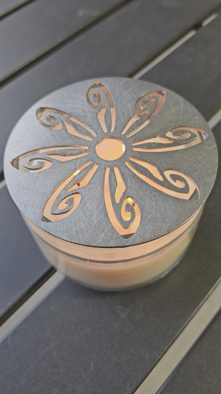 “Radiant Wings Candle Topper featuring decorative cutout design in metal finish for improved candle burning performance.”